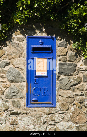 dh  ST PETER PORT GUERNSEY Guernsey blue wall GR post office box postal postbox mail letter channel island Stock Photo