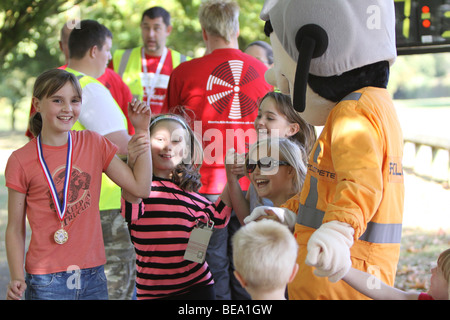 Runners and children in the Fun Run for Hertfordshire's Air Ambulance at Fairlands Valley Park Stevenage 27th September 2009 Stock Photo