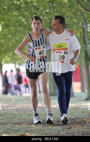 Two runners in the Fun Run for Hertfordshire Ambulance at Fairlands Valley Park Stevenage 27th September 2009 Stock Photo