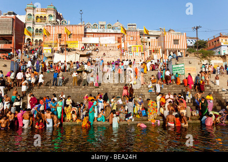 Bathing in the Ganges River at Nedar Ghat in Varanasi India Stock Photo