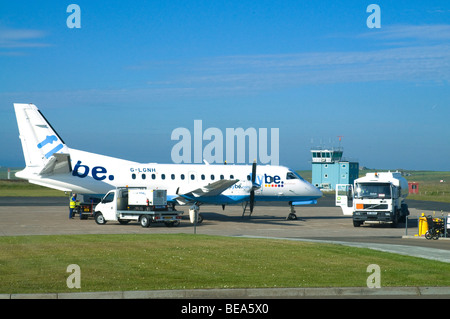 dh G-LGNH Flybe Saab 340 KIRKWALL AIRPORT ORKNEY ISLES British Aircraft on runway refueling 340b turbo prop refuel aeroplane plane Stock Photo