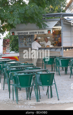 a cafe on the square jardim diana in front of the roman temple evora alentejo portugal Stock Photo