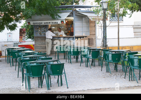 a cafe on the square jardim diana in front of the roman temple evora alentejo portugal Stock Photo