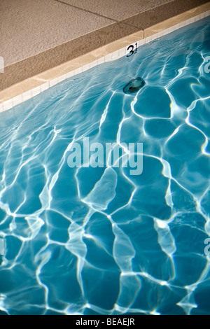 The edge of a swimming pool Stock Photo