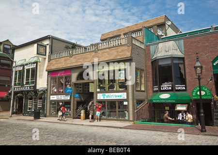 Stores and cobbled roadway on colourful historic Thames Street in the heart of Newport, Rhode Island, New England, U.S.A. Stock Photo