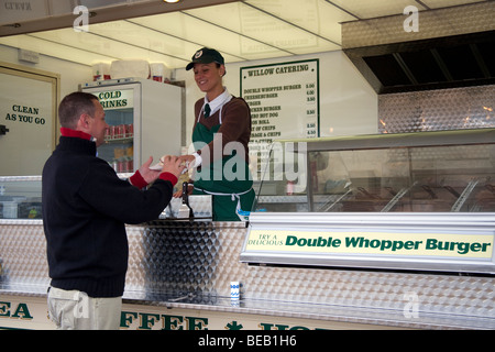 Purchasing a double whopper Burger at Willow Catering, Mobile Snack Van, Southport, Merseyside, UK Stock Photo