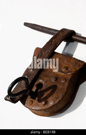 Close up of a rusty lock on old wooden door Stock Photo - Alamy