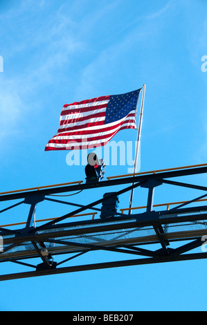 American flag blowing in the wind. Stock Photo