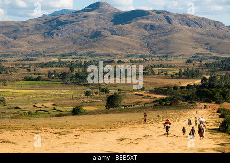 carrying goods home in the highlands of Madagascar Stock Photo