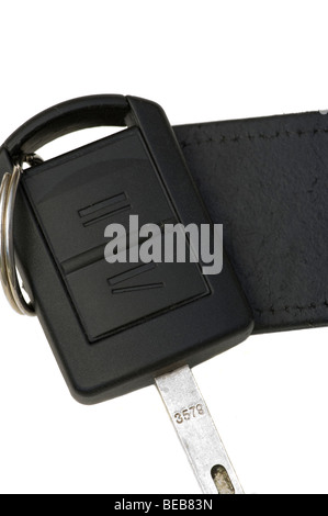 A Car Key On A Leather Fob Isolated On A White Background Stock Photo