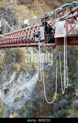 A man Bungy jumping with AJ Hackett Bungy off of Kawarau Bridge in Queenstown, New Zealand (the world's first commercial bungy) Stock Photo