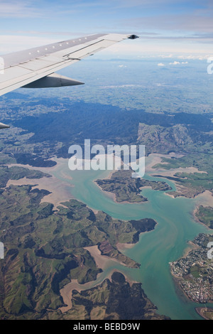 Plane flying over New Zealand Stock Photo