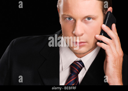 Businessman talking on a mobile phone Stock Photo
