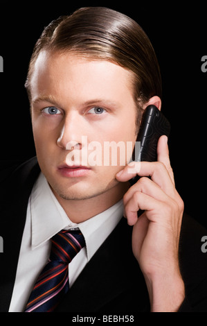 Businessman talking on a mobile phone Stock Photo