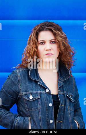 Portrait of a young woman looking serious Stock Photo