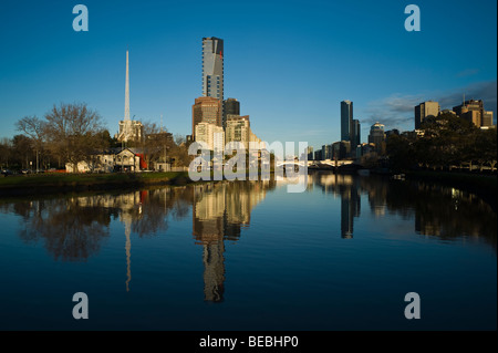 Melbourne's Arts Centre and Eureka Tower from across the Yarra River. Stock Photo
