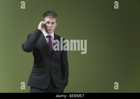Businessman talking on a mobile phone Stock Photo