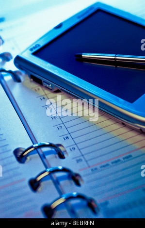 Personal data assistant on an personal organizer Stock Photo