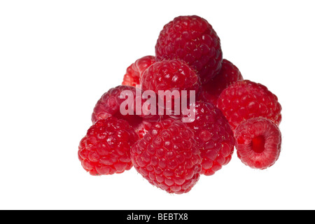 Premium Photo  One unripe and ripened raspberry closeup on a white surface