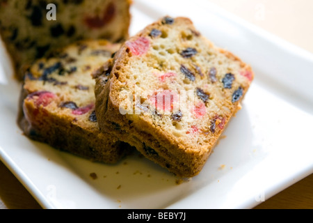 Slice of fruit cake on a plate Stock Photo