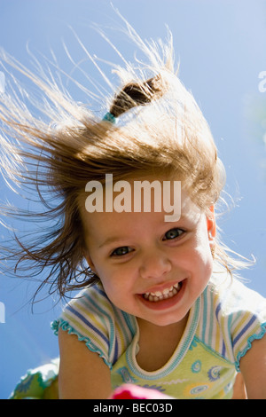 Low section view of a woman holding shopping bags Stock Photo