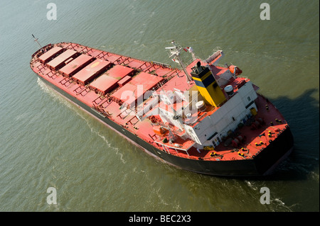 cargo ship leaving port Stock Photo