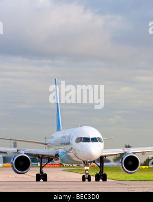 Thomas Cook aircraft taxiing for take off from Manchester Airport (Ringway Airport) in Manchester, England Stock Photo