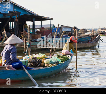 A young girl on a boat on Tong Le Sap Lake in Cambodia Stock Photo