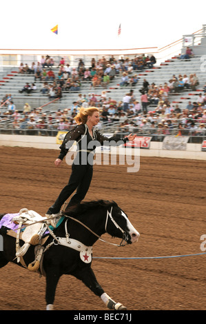 Cowgirls perform at the 84th Annual Tucson Rodeo, also know as Fiesta De Los Vaqueros, in Tucson, Arizona, USA. Stock Photo