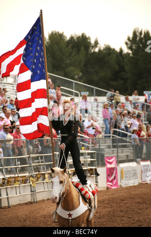 Cowgirls perform at the 84th Annual Tucson Rodeo, also know as Fiesta De Los Vaqueros, in Tucson, Arizona, USA. Stock Photo