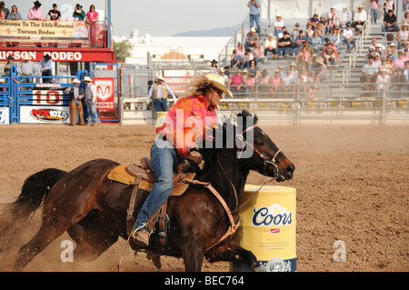 Cowgirls perform at the 84th Annual Tucson Rodeo, also know as Fiesta De Los Vaqueros, in Tucson, Arizona, USA. Stock Photo