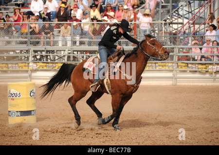 Cowgirls perform at the 84th Annual Tucson Rodeo, also know as Fiesta De Los Vaqueros, in Tucson, Arizona, USA. Stock Photo