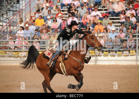 Cowgirls perform at the 84th Annual Tucson Rodeo, also know as Fiesta De Los Vaqueros, in Tucson, Arizona, USA. Stock Photo