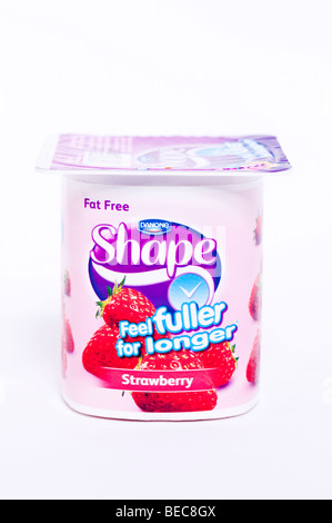 A Danone Shape fat free strawberry yoghurt on a white background Stock Photo