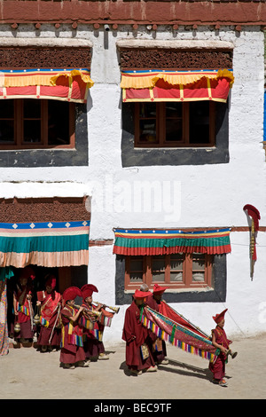 Buddhist monks playing the tibetan horns and trumpets. Phyang Gompa festival. Ladakh. India Stock Photo