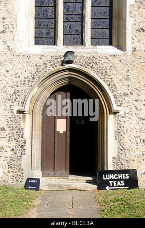 Lunches and tea sign at front door of Aldenham Church, Hertfordshire, England. Stock Photo