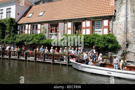 Mooring for boat tours through canals, historic center of Bruges, Flanders, Belgium, Europe Stock Photo
