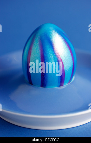 Coloured egg, Easter egg, in an egg cup Stock Photo