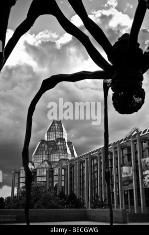 'Maman' a giant spider sculpture created by Louise Bourgeois dwarfs the National Art Gallery of Canada in Ottawa, Ontario. Stock Photo