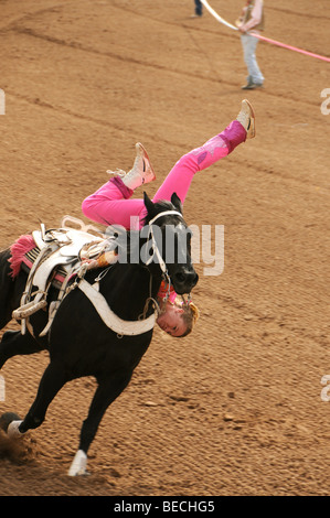 Cowgirls perform at the 84th Annual Tucson Rodeo, also know as Fiesta De Los Vaqueros, in Tucson, Arizona, USA. Stock Photo