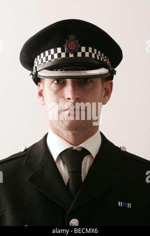 British Policeman on plain background Stock Photo