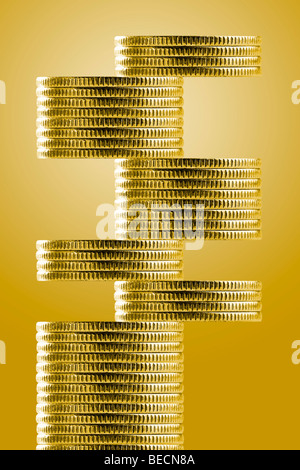 Unstable stack of golden coins Stock Photo - Alamy