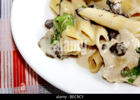 Italian Style Roast Chicken and Wild Mushroom And Spinach Pasta Meal With No People Stock Photo