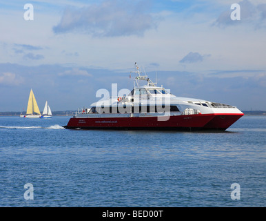 Red Jet 3 Red Funnel catamaran crossing from Southampton to Cowes. Stock Photo