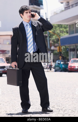 Businessman talking on a mobile phone Stock Photo
