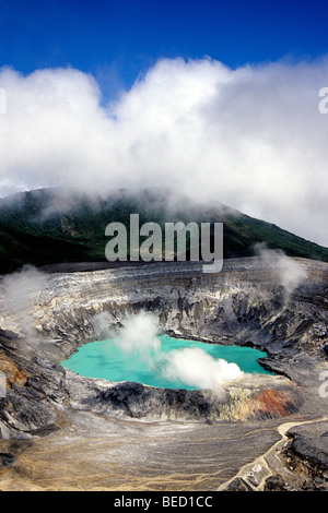 Poás Volcano, national park in the central highlands of the Alajuela Province, main crater with blue water, sulphur vapour, smo Stock Photo