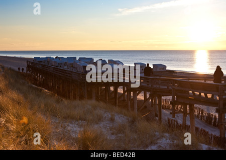 Roofed wicker beach chairs in the evening sun near Kampen, Sylt Island, North Frisian Islands, Schleswig-Holstein, Germany, Eur Stock Photo