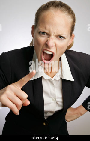 Angry business woman Stock Photo