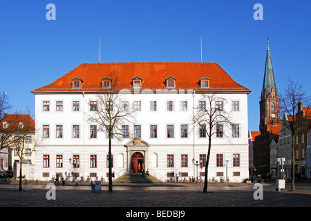 Ducal castle on the Lueneburg market sqaure, tower of Nikolaikirche Church in the back, St. Nicolai, Lueneburg, historic centre Stock Photo