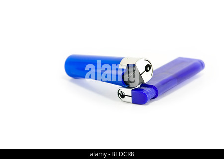 Two blue plastic lighters isolated on white Stock Photo